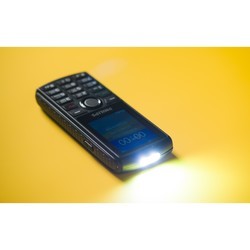 Мобильный телефон Philips Xenium E218 (серый)